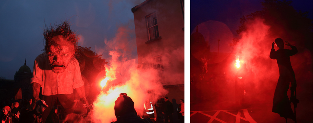 Macnas parade galway 2014 Troll past Salmon Weir bridge aliens red smoke stilts